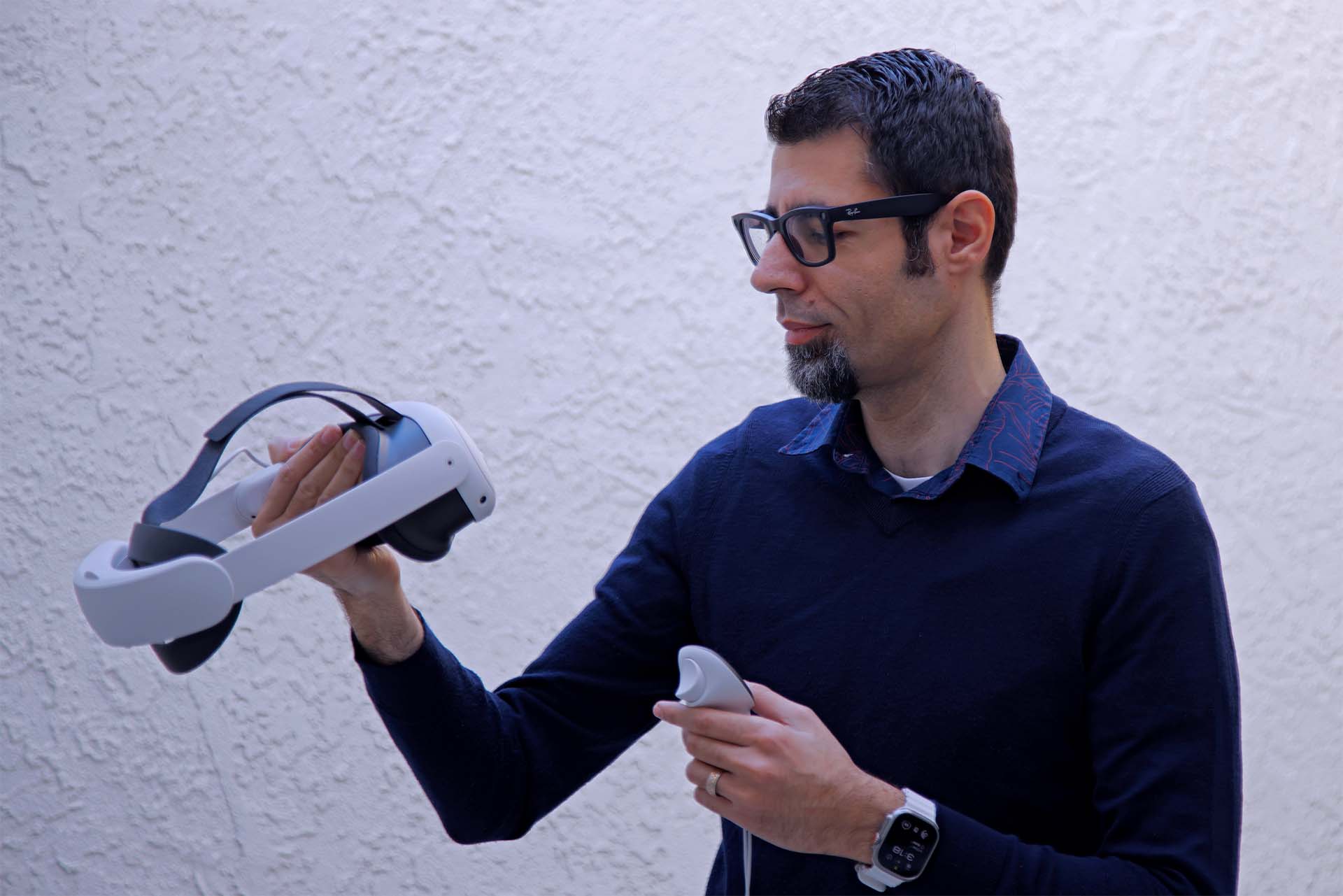 Image of Arvin Tehrani with a mixed reality headset in his hands